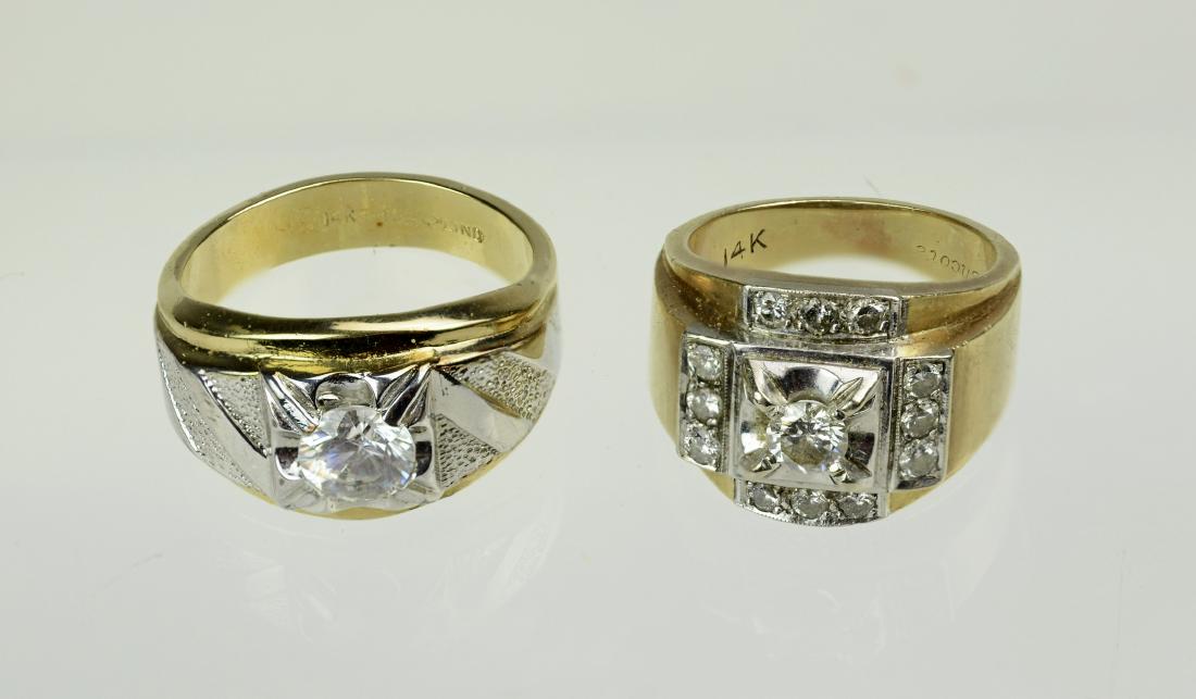 14K YG diamond ring & gold plated ring: 14K YG diamond ring, 40-45 pt center diamond with (12) 5 pt side stones, tdw about 1.0 carat, size 7, 6.9 dwt; along with a 14K HGE ring with clear non-diamond, size 10 1/2