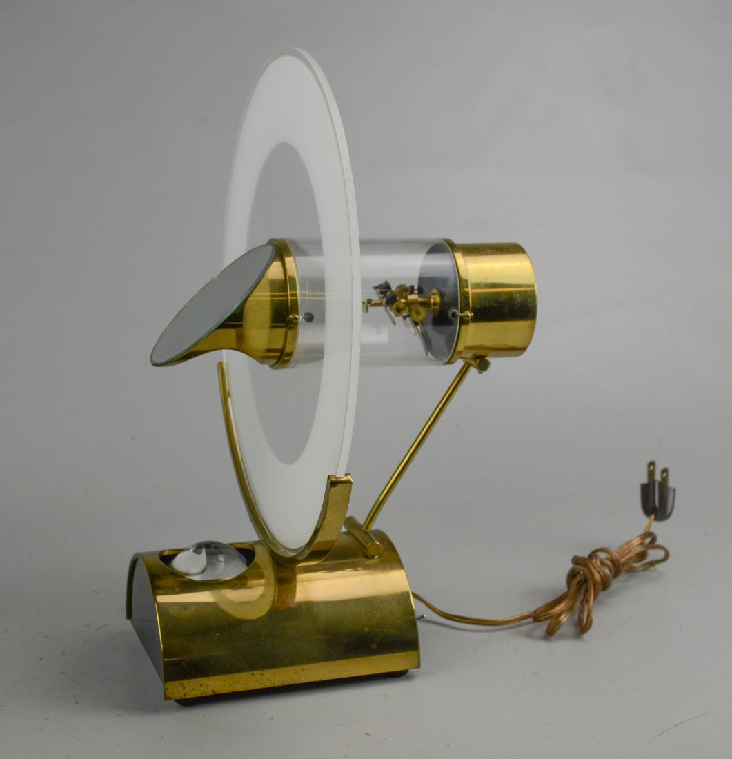 Jerome Simon, Conceptual lighted clock: Jerome Simon, Conceptual lighted clock, Design in Time & Light, designed 1981, scratch signed and dated "J. Simon, March 13, '81" on bottom, with a paper label as well. There is an example in MoMA in