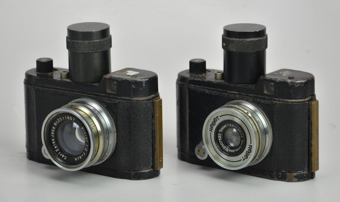 (2) Berning Robot II cameras: 2 Berning Robot II cameras, one with Carl Zeiss Jena Tessar 1:2.8 f=3 3/4cm lens the other with Carl Zeiss Biotar 1:2 f=4cm. Both are labeled "Luftwaffen-Eigentum" produced for German military use in