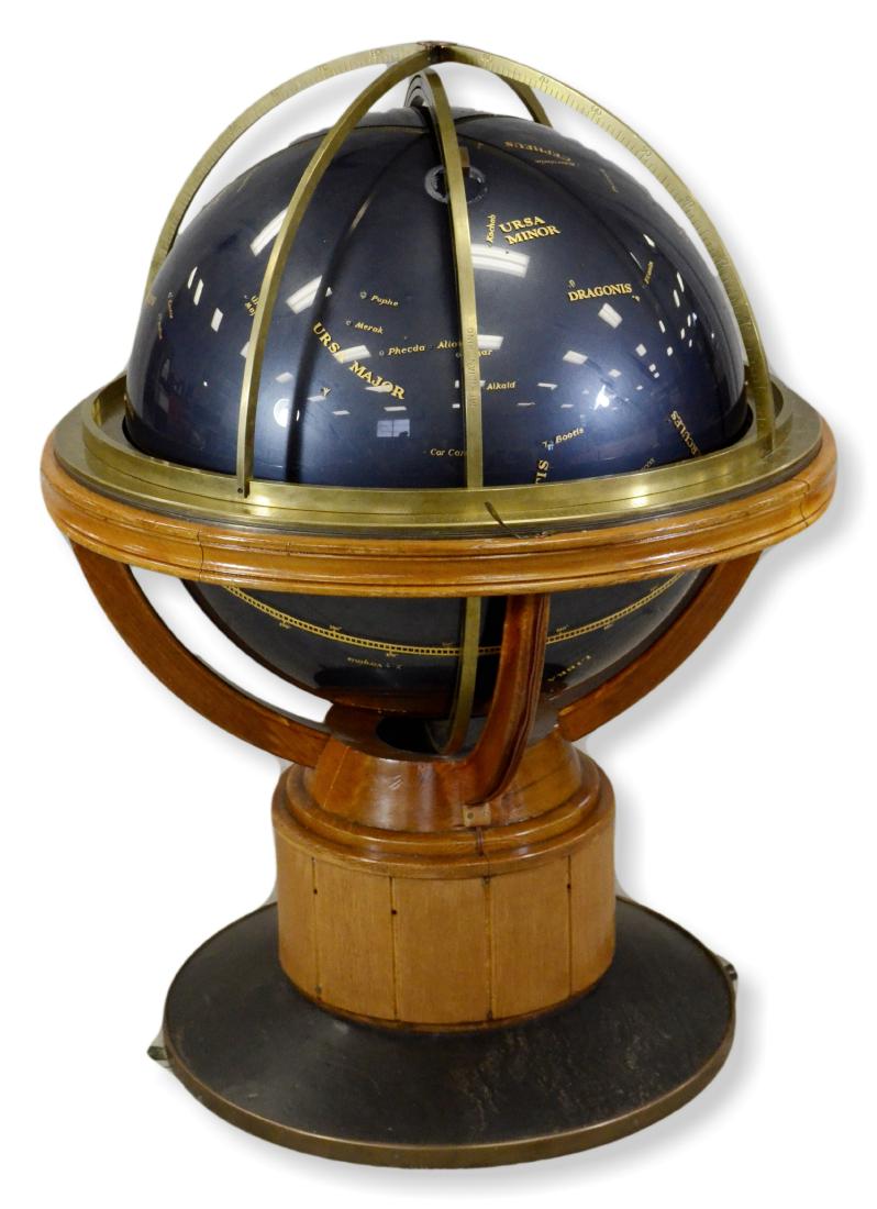 Celestial Floor Globe on Bronze and Oak Stand: Plastic Celestial Floor Globe on Bronze and Oak Stand, measures 50" high X 38" diameter, 30" diameter globe, plastic, probably nautical, globe probably replaced, no manufacturer mark. probably nautica