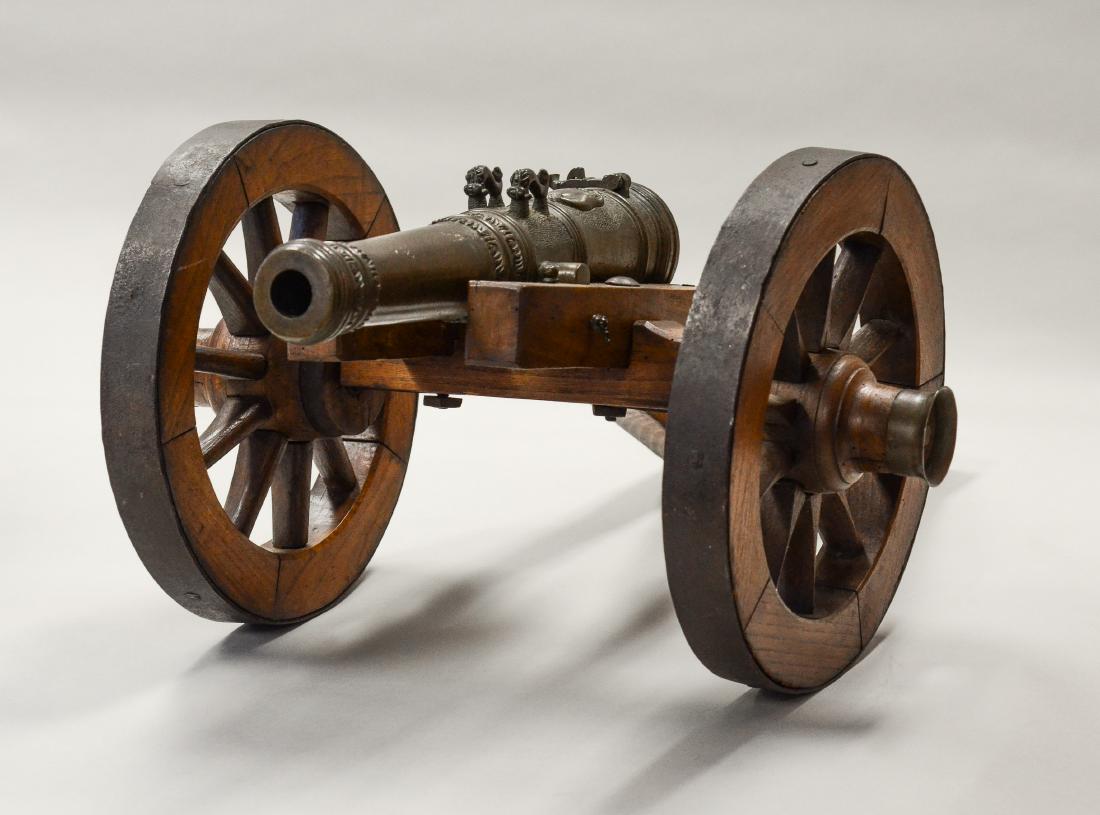 Early Ornate Brass Signal Cannon on Wood Carriage, 32": Early Ornate Brass Signal Cannon on Wood Carriage, iron wrapped wheels, carriage pinned mortise & tenon construction, with an oval brass tag at rear, "Hallum / Jan J Bennema / 1855", Continental, 32" 