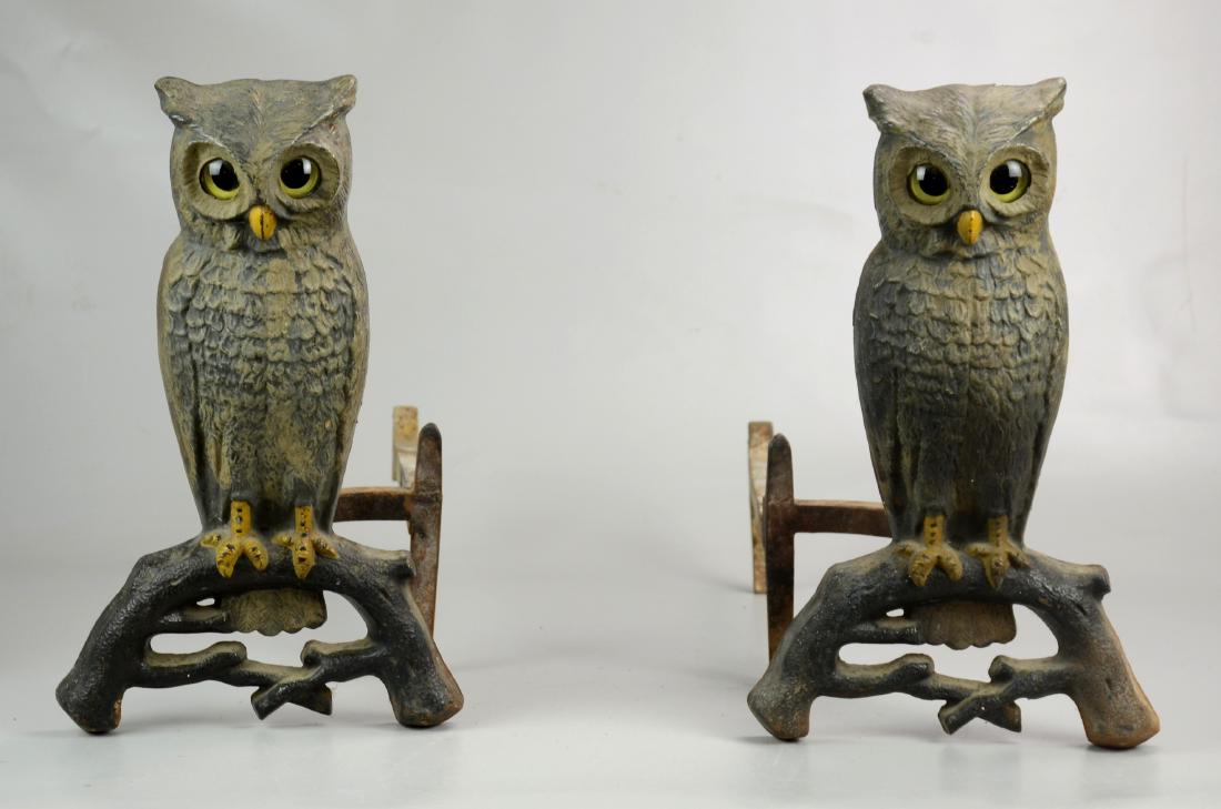 Pr Cast Iron Owl Andirons: Pr cast iron owl andirons, glass eyes, remnants of old paint, marked "9009 2", 15" h x 9" w x 19-3/4" d, back leg of one bracket support broken