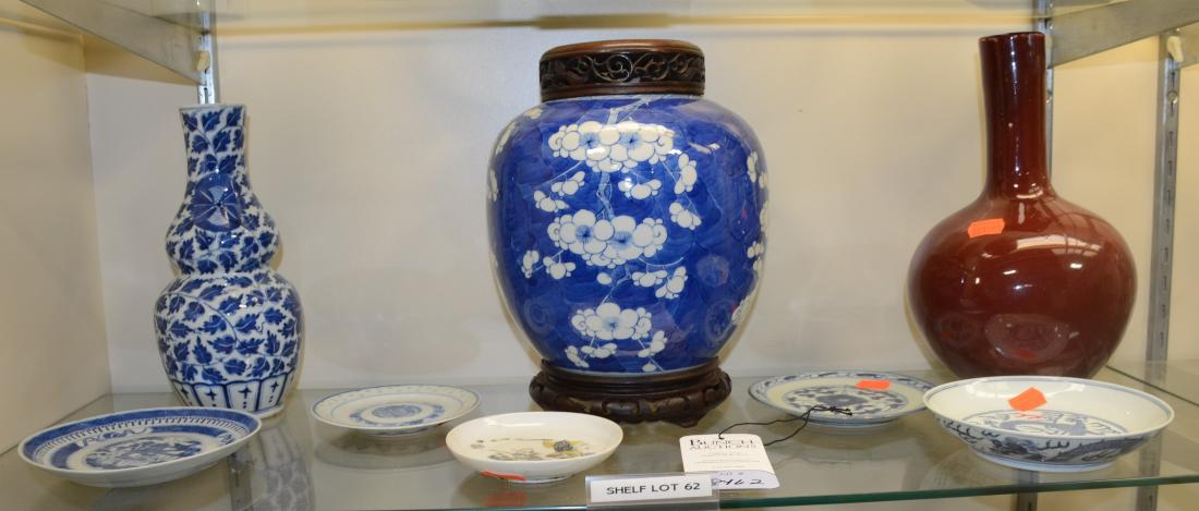 Shelf #62 - Asian Porcelain: Shelf #62 - Blue and white ginger jar, carved and pierced wood lid, wood stand, sang de boeuf vase, blue & white vase & (4) plates, white plate with warrior drawing