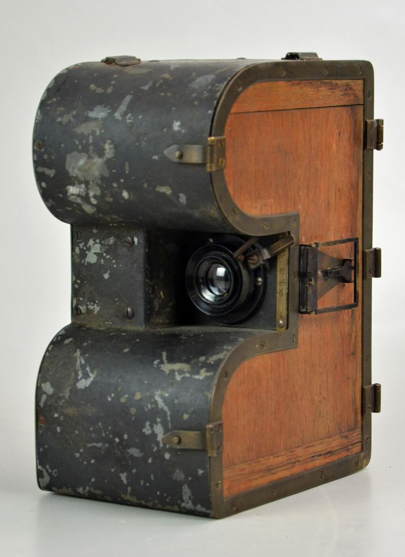 Antique Movie Camera: Antique wood body hand crank movie camera with Rudersdorf Berlin Ruo Kino 50mm f/3.5 lens. Handle turns and moves internal machinery nicely.