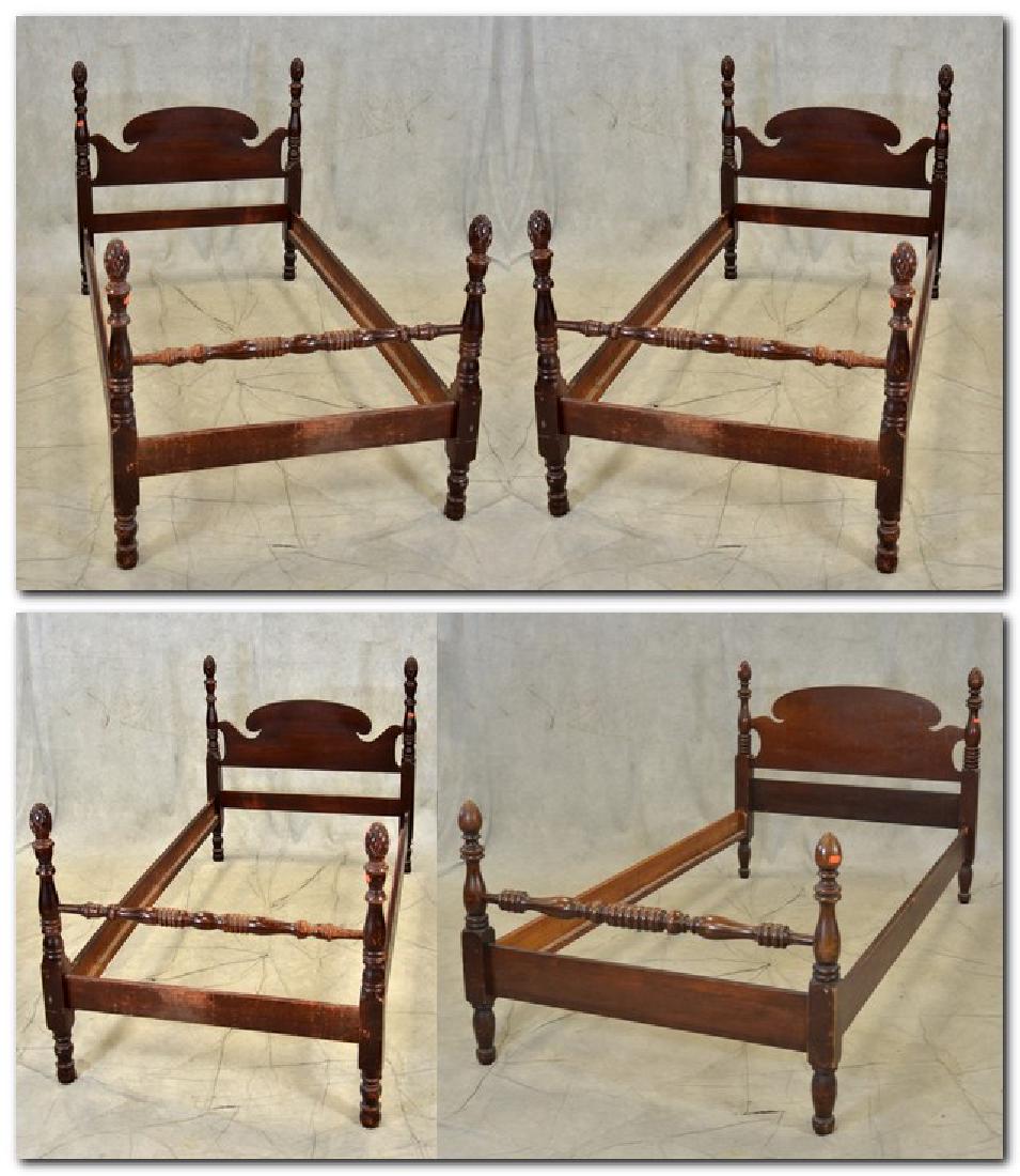 (2) pr Mahogany acorn twin poster beds: (2) pr mahogany acorn twin poster beds, acorn finials, turned posts, scrolled headboard, 43"h x 41-1/2"w, 4 beds in all, both sets are in fair condition with worn finish, both sets are matching pairs