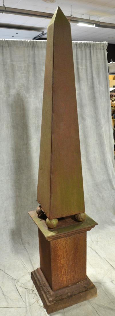 Sheet metal obelisk on pedestal: Sheet metal obelisk on pedestal, one piece, square pedestal base, 18"square x 28-1/2"h, top 65"h, considerable surface rust and rust losses