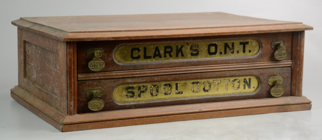 2-drawer walnut spool cabinet: two drawer walnut Clark's Ont. spool cotton cabinet, 22"w x 7-1/2"h