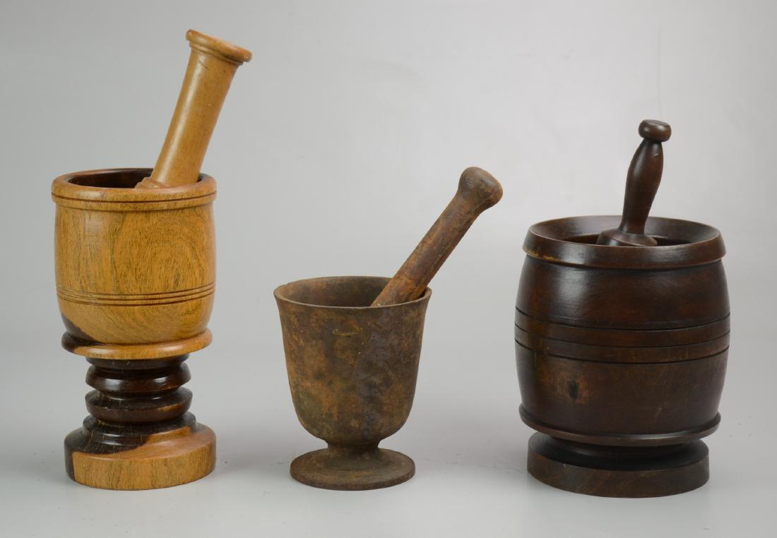 (3) Mortar and Pestles: (2) Wood Mortar and Pestles (Largest Measuring 4-3/4" dia x 9" h) and (1) Iron Mortar and Pestle