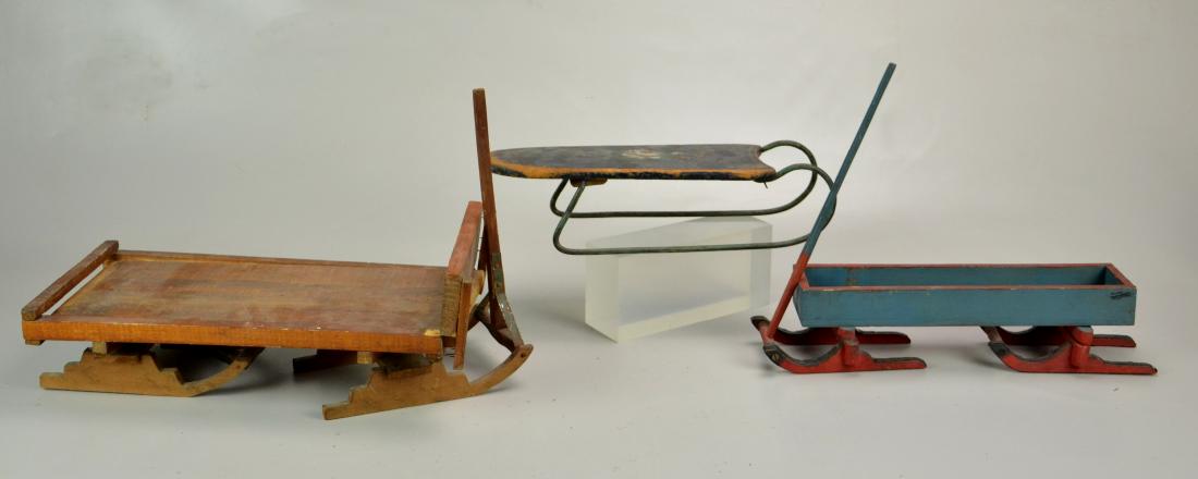 (3) Handmade Doll Sleds: (3) Handmade doll sleds, one painted blue & red, largest 15-1/4" l x 7-1/2" w excluding handle