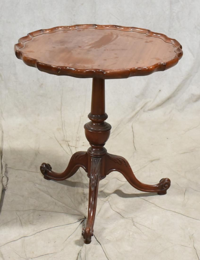 Mahogany Elite Tables Piecrust tea table: Mahogany Elite Tables Piecrust tea table, pedestal with turned post, splayed legs with acanthus leaf decoration at knees over scrolled feet, 28-1/2"h x 26"w