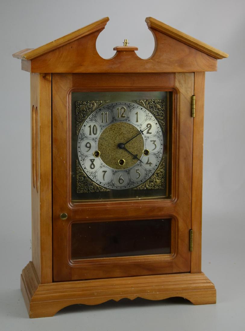 German Clock in Custom Wood Case: German Clock in Custom Wood Case Including Key and Pendulum (Measures 13-1/2" l x 6-1/4" w x 20-1/2" h), (Runs Briefly and Stops, No warranty intended), (Missing Finial)