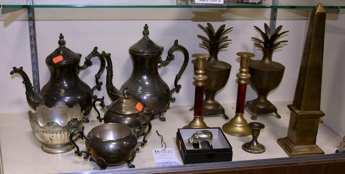 Shelf #10 - Silverplate and Brass Items: Shelf #10 - Brass Pineapple Candlesticks, Rogers Teapot, coffee pot, Sugar, Creamer, Dansk Silverplate Hippo Paperweight, Brass Obelisk, Brass Candlesticks, handled bowl, silver plated candlestick