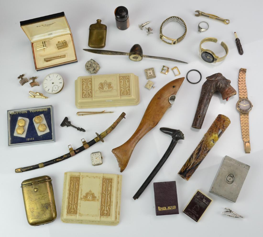 Shelf #13 - Tobacco Items, Cane Tops, Watch Parts: Shelf #13 - (2) Hamilton Watch Boxes, I.W. Co Pocket Watch Movement, Snuff Box, Brass Match Case, Brass Cigarette Holder, Nudey Ring, Swank Cufflinks and Tie Clip, Bowser and Co Desktop Propeller, Dog