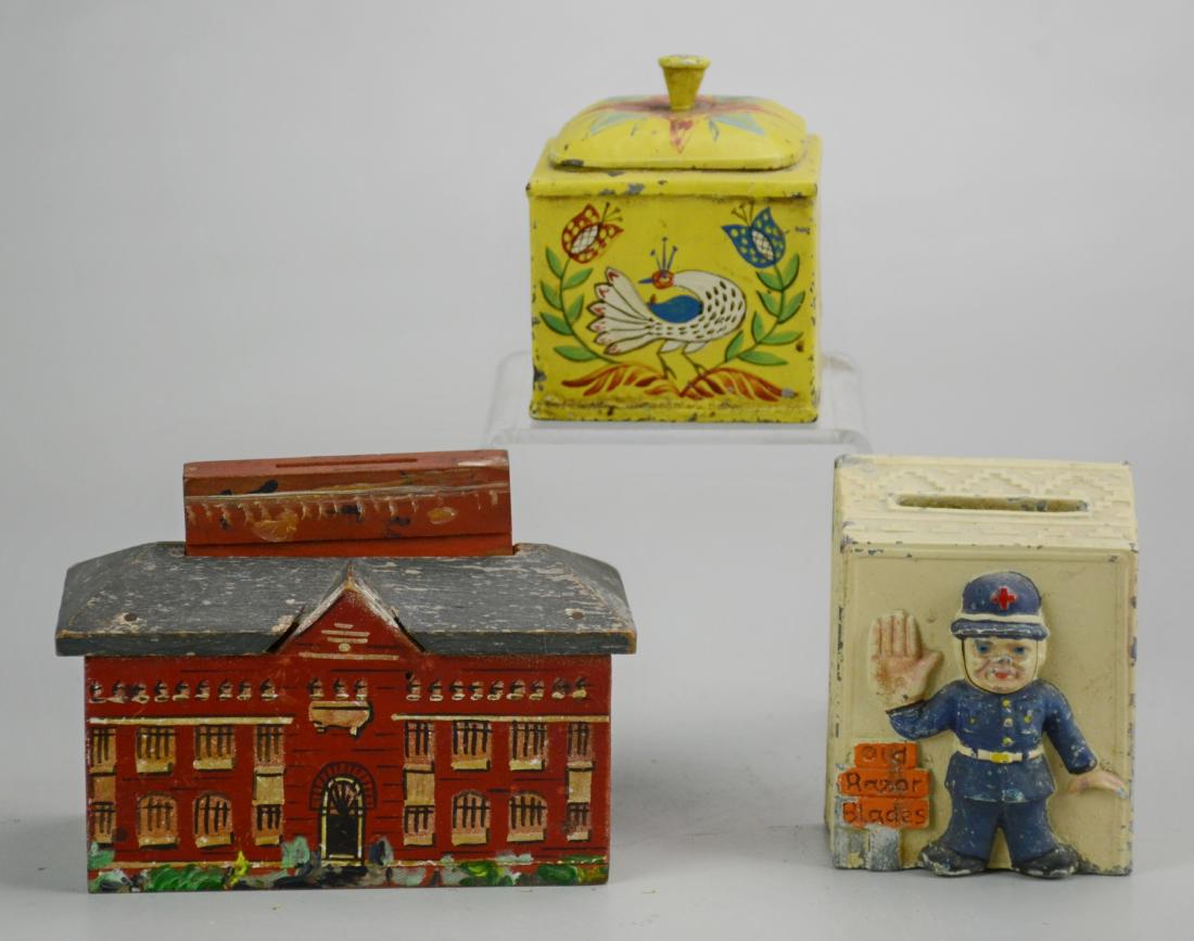 Razor Blade Safe, Bank, Toleware Box: (3) Boxes, c/o cast metal "Old Razor Blades" receptacle bank made in Austria, hand painted wood building bank, tole painted hinged box with Pennsylvania Dutch design, largest 4" h