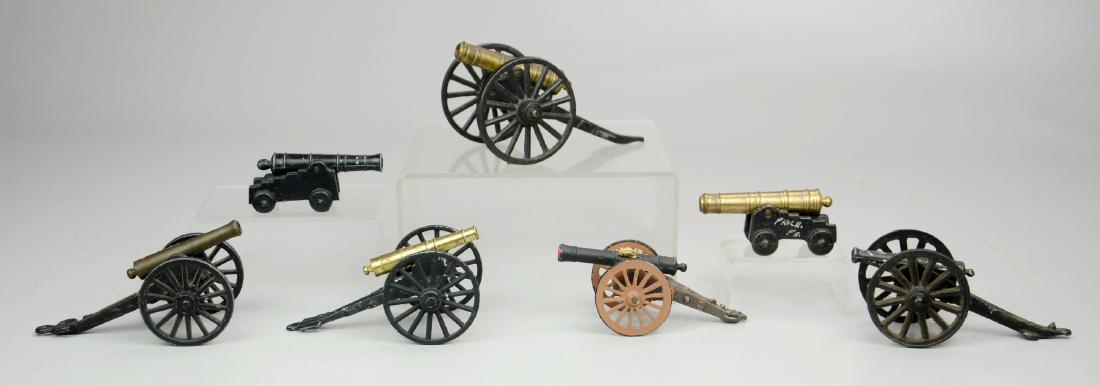(7) Metal Toy Cannons: (7) Metal Toy Cannons Including Penncraft, MFCO (Largest Measuring 5-1/4" l x 2-3/4" w x 2-1/2" h)