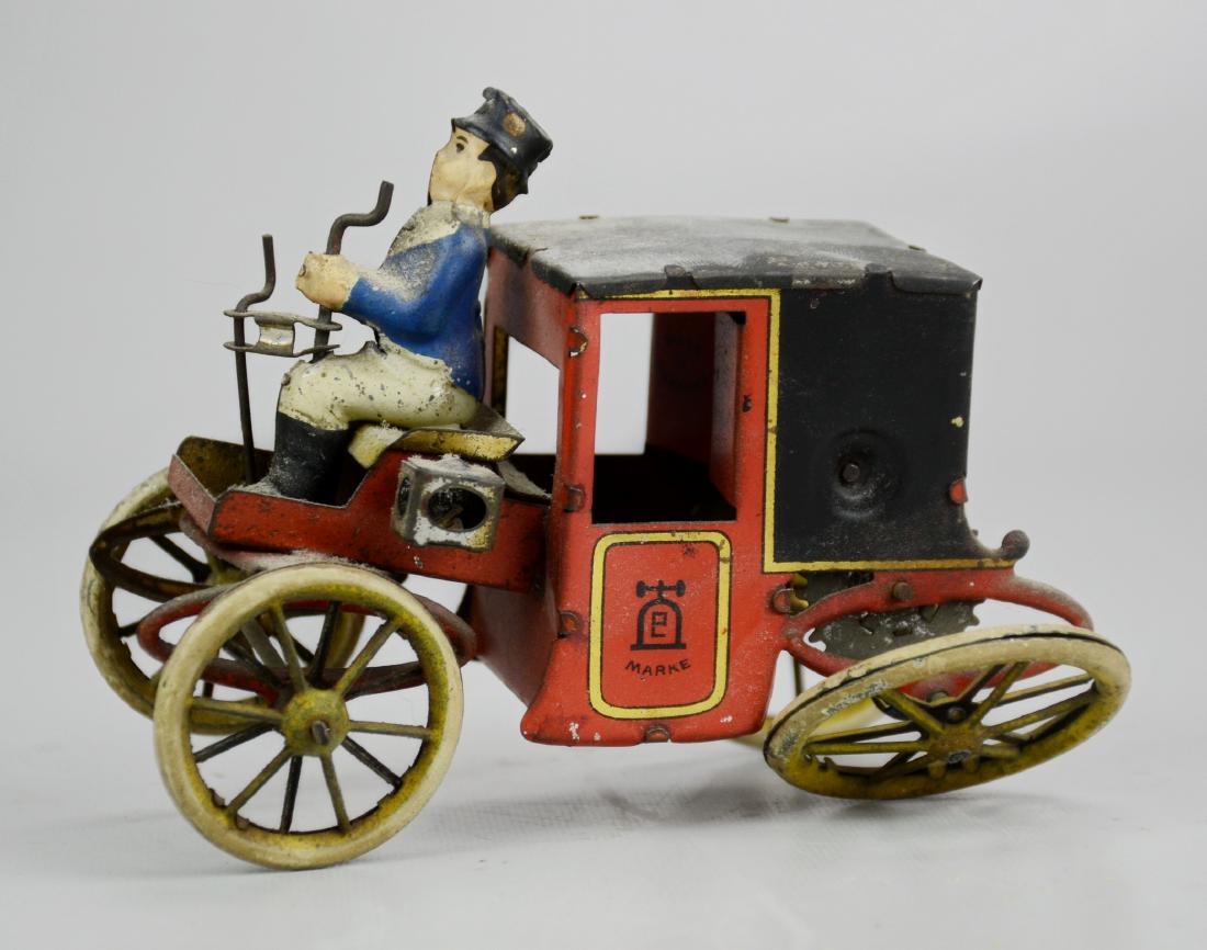 Lehmann Marke Horseless Carriage Tin Wind-Up: Lehmann Marke Horseless Carriage Tin Wind-Up (5" l x 2-1/2" w x 3-1/4" h), (Not Working, Back Wheel is Loose)