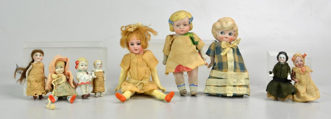 (7) Miniature Porcelain Dolls: (7) Miniature porcelain dolls, including one marked "Germany 18/0" (open mouth, 4 teeth, sleep eyes, composite body),others all porcelain, tallest 7-1/4", smallest 2-1/2",