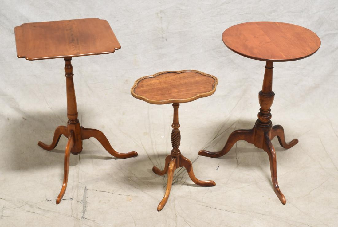 Eldred Wheeler, (2) other candlestands: Eldred Wheeler cherry candlestand, along with tilt top candlestand, Brandt walnut finish candlestand, all with turned pedestal and splayed feet, largest 25"h x 16-1/4"w x 16"d