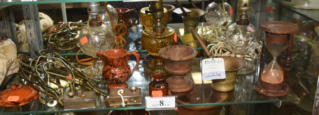 Shelf #8 - Oil Lamps, Harps, Timer, Mortar & Pestle,: Shelf #8 - (3) Oil lamps, (3) pcs. redware, brass mortar & pestle, wood and glass sand timer, treen pestle, (2) tin lamps and several harps