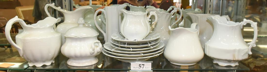 Shelf #57 - (15) Pcs. Ironstone: Shelf #57 - (15) Pcs ironstone c/o (8) pitchers, (6) plates, (1) covered sugar bowl, largest 8" h, various makers including "Queen", "Etruria", "Meakin", spider cracks, stains, chip