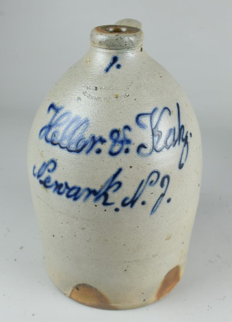J. Zipf, Newark, NJ Stoneware Jug: J. Zipf, Newark, NJ, cobalt script decorated stoneware jug, "Heller & Katz Newark, NJ", 12"h x 7" dia.