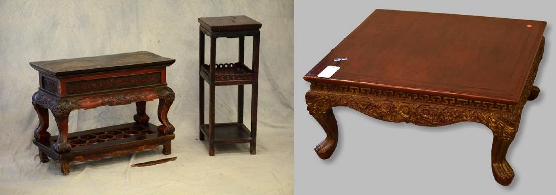 Asian style red & black painted table w/ dragon heads,: Asian style red & black painted table w/ dragon heads at corners, along with red & black painted three tier stand, Asian style painted coffee table, largest 24"h x 32"w x 15"d, wear to paint