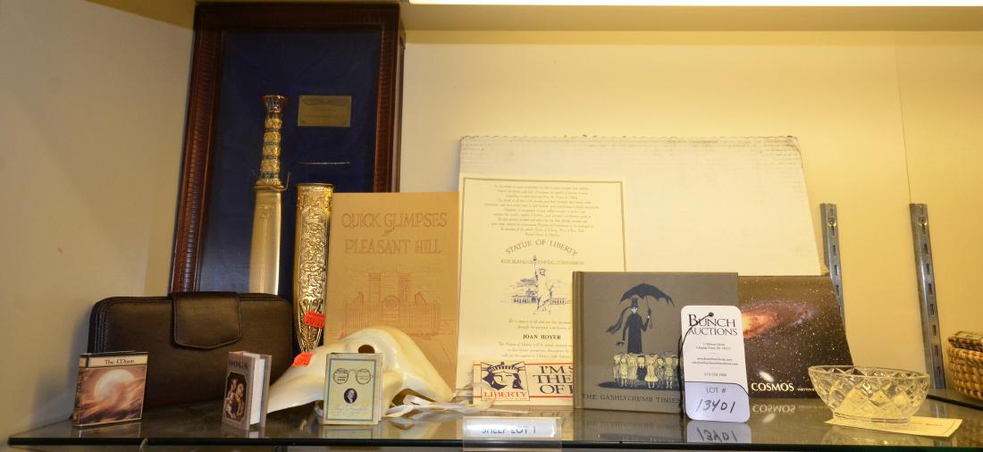 Shelf #1 - King Tutankhamun Dagger: Shelf #1 - Franklin Mint King Tutankhamun Golden Dagger in display case, Phantom of the Opera mask, miniature books, Lenox Crystal Diamond bowl, Cabin Creek leather wallet, Star Registry