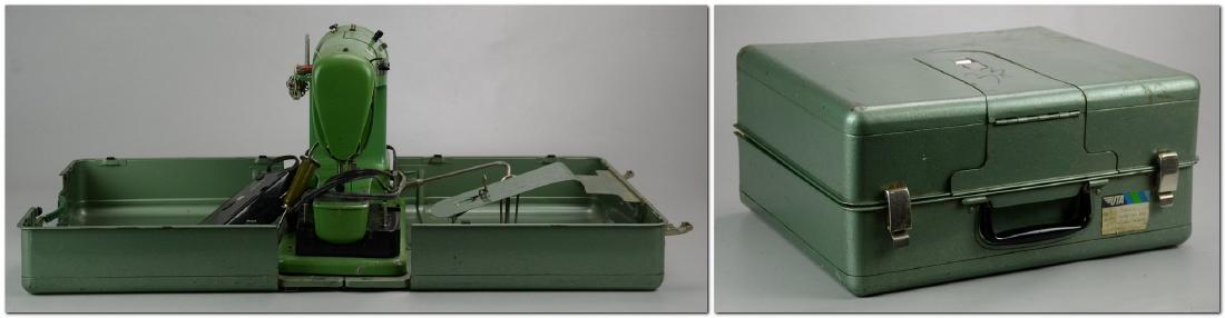 (2) Elna Supermatic Sewing Machines: (2) Elna Supermatic mid-century portable sewing machines & accessories, travel case converts to extra large quilting platform