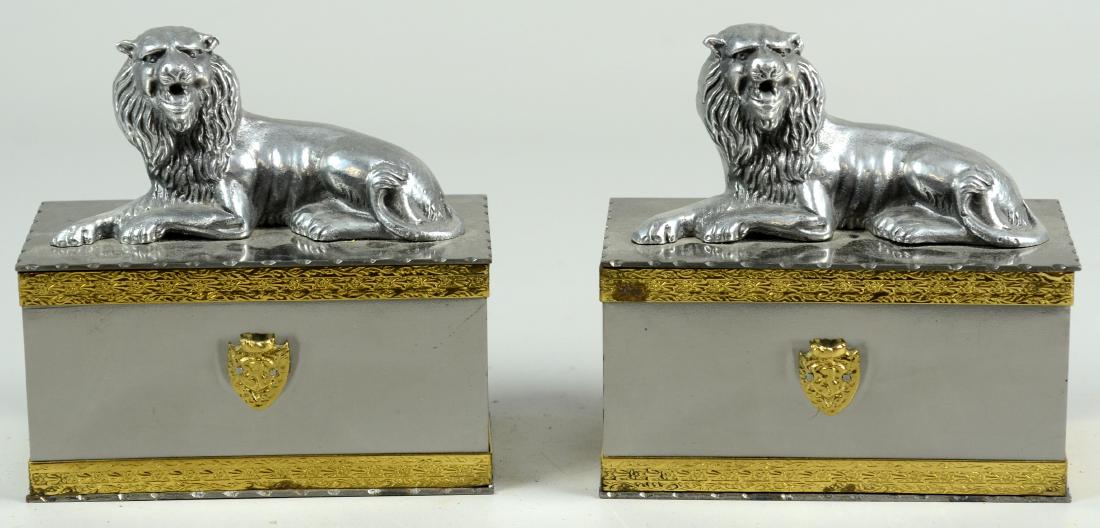 Italian Metal Cigarette Boxes With Lion Figures: Silver Colored Metal Cigarette Boxes With Lion Figures on Lids, Gold Tone Bands with Raised Florals and Leather Lined Interior with Stickers Made in Italy (6-1/4" l x 3-1/4" w x 6-1/4" h)