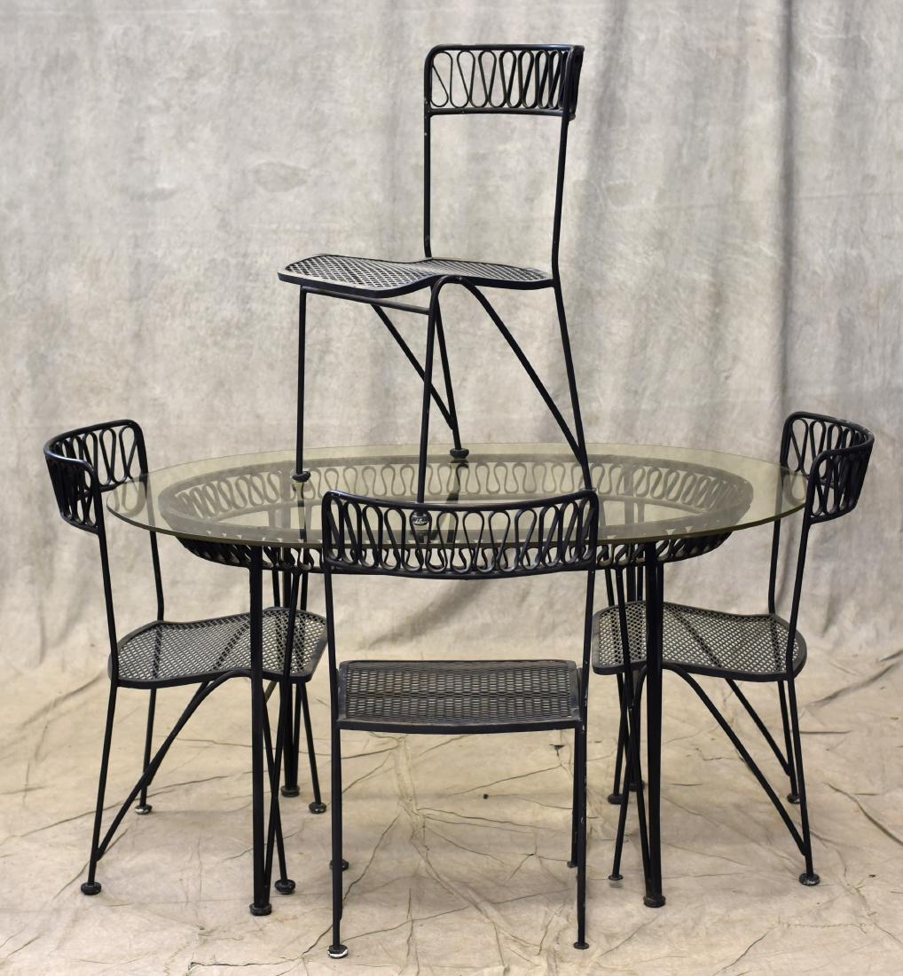 (5) pc John Salterini patio set: (5) pc John Salterini patio set, c/o 4 black metal side chairs with mesh seats, oval glass top table with metal base, table 29-1/2"h x 54-1/4"w x 36"d