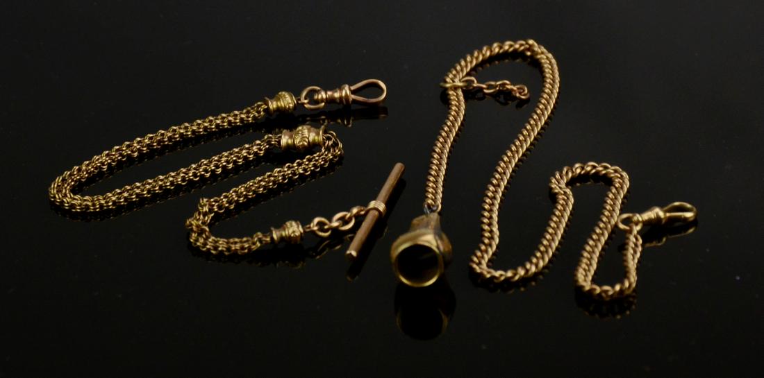 (2) unm 14K YG watch chains, 35 dwt: (2) unm 14K YG watch chains, one with cigar cutter set with 3-5 pt diamond, 19" long, the other a double chain with T-bar, 11" long, no marks, 35 dwt