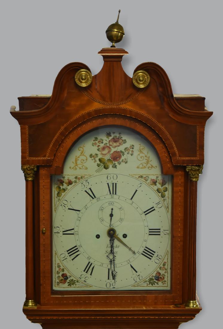 Mahogany Longcase English Clock, Hugh Knight,: Mahogany Longcase English Clock, Hugh Knight, Stone,1825-1840, broken scroll top with side pediments, 8 day brass movement, arched painted dial, triple peaked Gothic door, reeded columns with ornate c