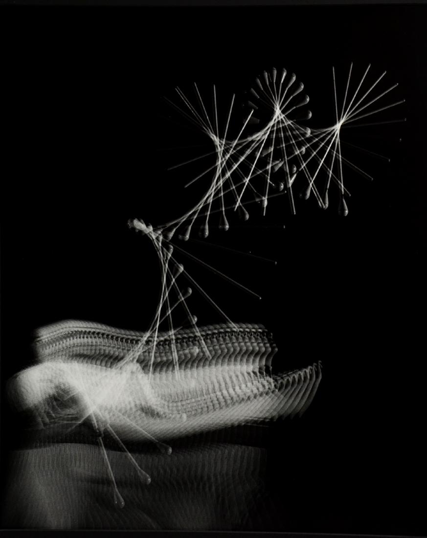 Harold Edgerton Photograph "Drum Majorette": Harold Edgerton (American 1903-1990) photograph "Drum Majorette", gelatin silver print on paper, signed on back, 17-3/8" x 14-1/2" image, 20" x 16" sheet, very good condition, from a corporate collect