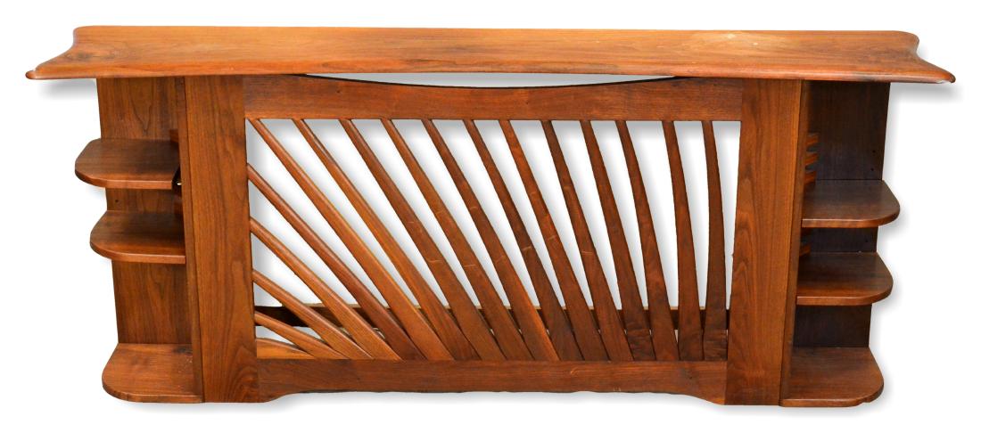 Robert Whitley style walnut console: Robert Whitley style walnut console, open leaf decoration at center flanked by three shelves, free formed top, 29-1/2"h x 68-1/2"w x 14-1/2"d