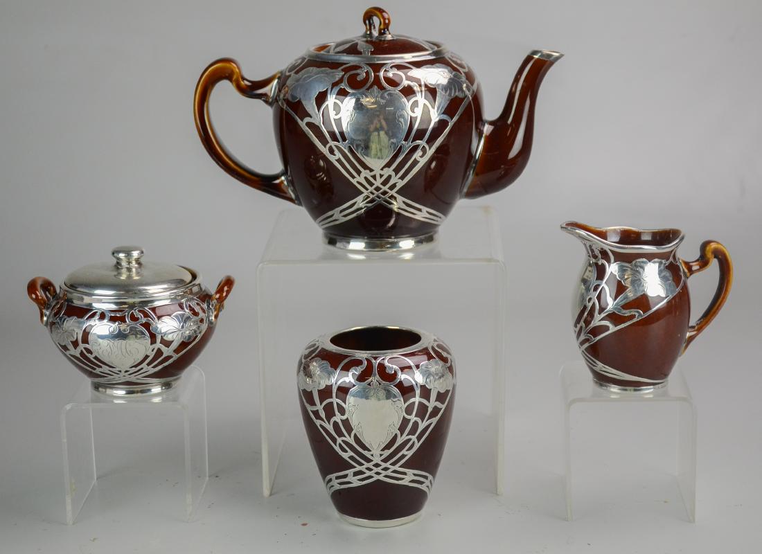 Lenox Silver Overlay Tea Set and Vase: Lenox Silver Overlay Teapot (Hairlines, Interior Rim Chip), Monogrammed Sugar (Lid is Marked Sterling, Interior Rim Damage), Creamer (Hairlines and Repairs), and Vase