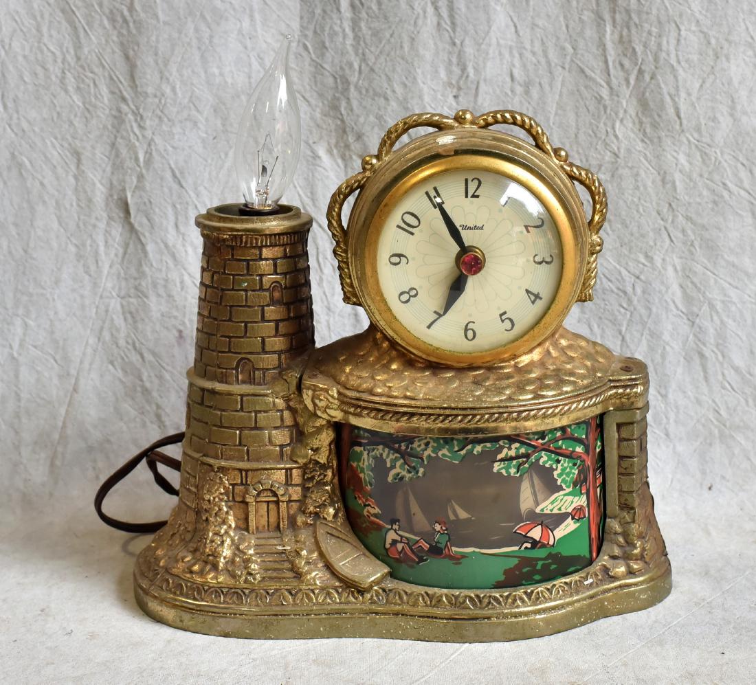 United Motion Lamp of Sailboats with Lighthouse: United Motion Lamp of Sailboats with Lighthouse (Measures 10-1/2" l x 6-1/4" w x 11-1/2" h), (Clock, Light and Motion Works, No Warranty Intended), (Missing Shade for Lamp)