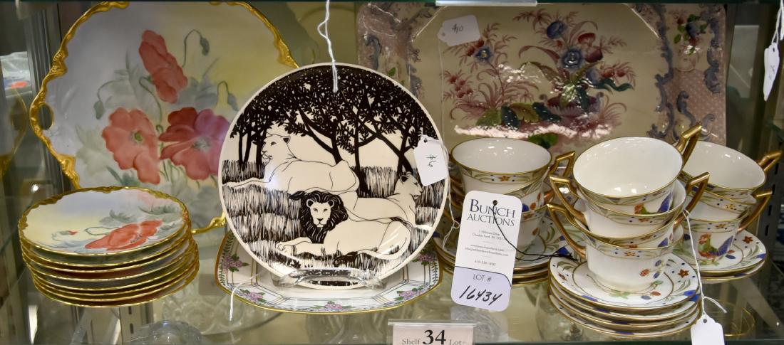 Shelf #34 - Porcelain Dinnerware: Shelf #34 - Porcelain dinnerware, including Krautheim hand painted dessert set, La Seynie Limoges cups & saucers, D&C France cut corner square plate, lions plate, floral platter