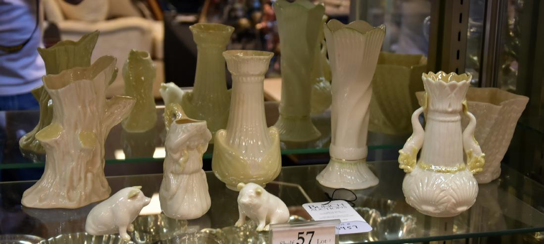 Shelf #57 - Belleek Porcelain: Shelf #57 - Belleek Porcelain Including Vase, Tree Trunk Vase, Vase with Fish Handles, Girl Creamer, (2) Pigs