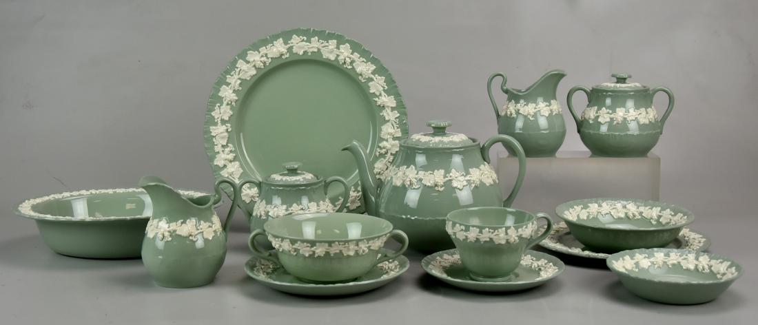 (110) Pcs Wedgwood White on Green Queensware: (110) Ps Wedgwood dinnerware, Embossed Queensware (white on green), c/o 13 dinner plates (one with hairline), 13 salad plates, 13 B&B plates, 9 cereal bowls, 10 cream soup bowls, 11 cream soup saucers