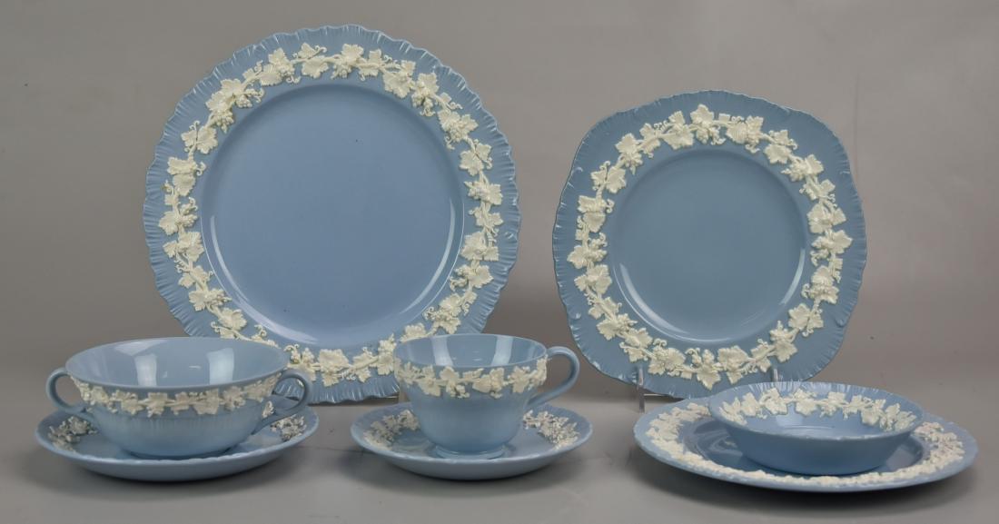 (111) Pcs Wedgwood White on Blue Queensware: (111) Pcs Wedgwood dinnerware, Embossed Queensware (white on blue), c/o 12 dinner plates, 12 luncheon plates, 12 salad plates, 12 B&B plates, 12 dessert plates, 12 fruit bowls, 8 cream soup bowls, 8 c