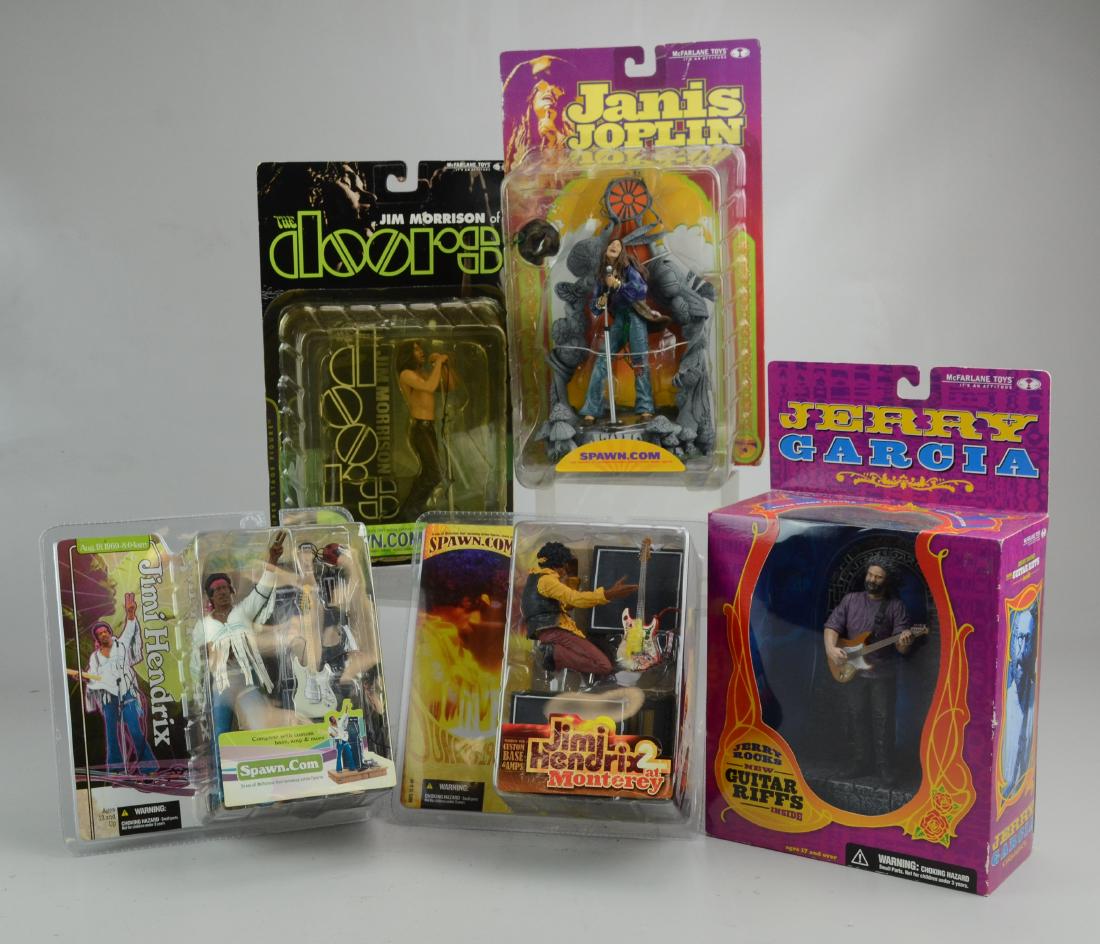 (5) Classic Rock Figures: (5) Classic Rock figures, McFarlane, c/o Jerry Garcia, Janis Joplin, The Doors Jim Morrison (package slight wear), Jimi Hendrix - Monterey, Jimi Hendrix - Woodstock 8:04 AM, in original packaging