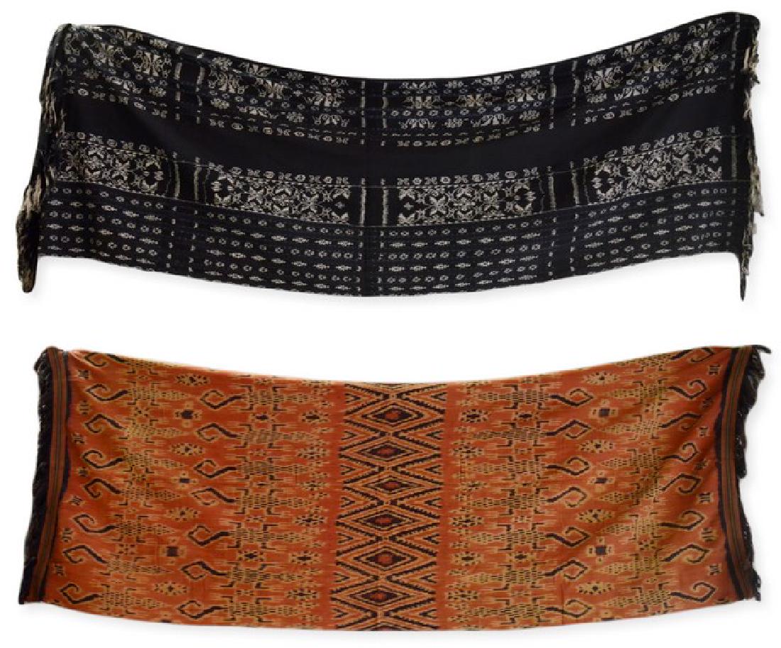 (2) Finely Woven Indonesian Textiles: Finely woven Indonesian textile grouping to include thickly woven and dyed rust and ochre panel with animalia, 32" x 84" and navy striped floral panel 92" x 36" both with fringe hem
