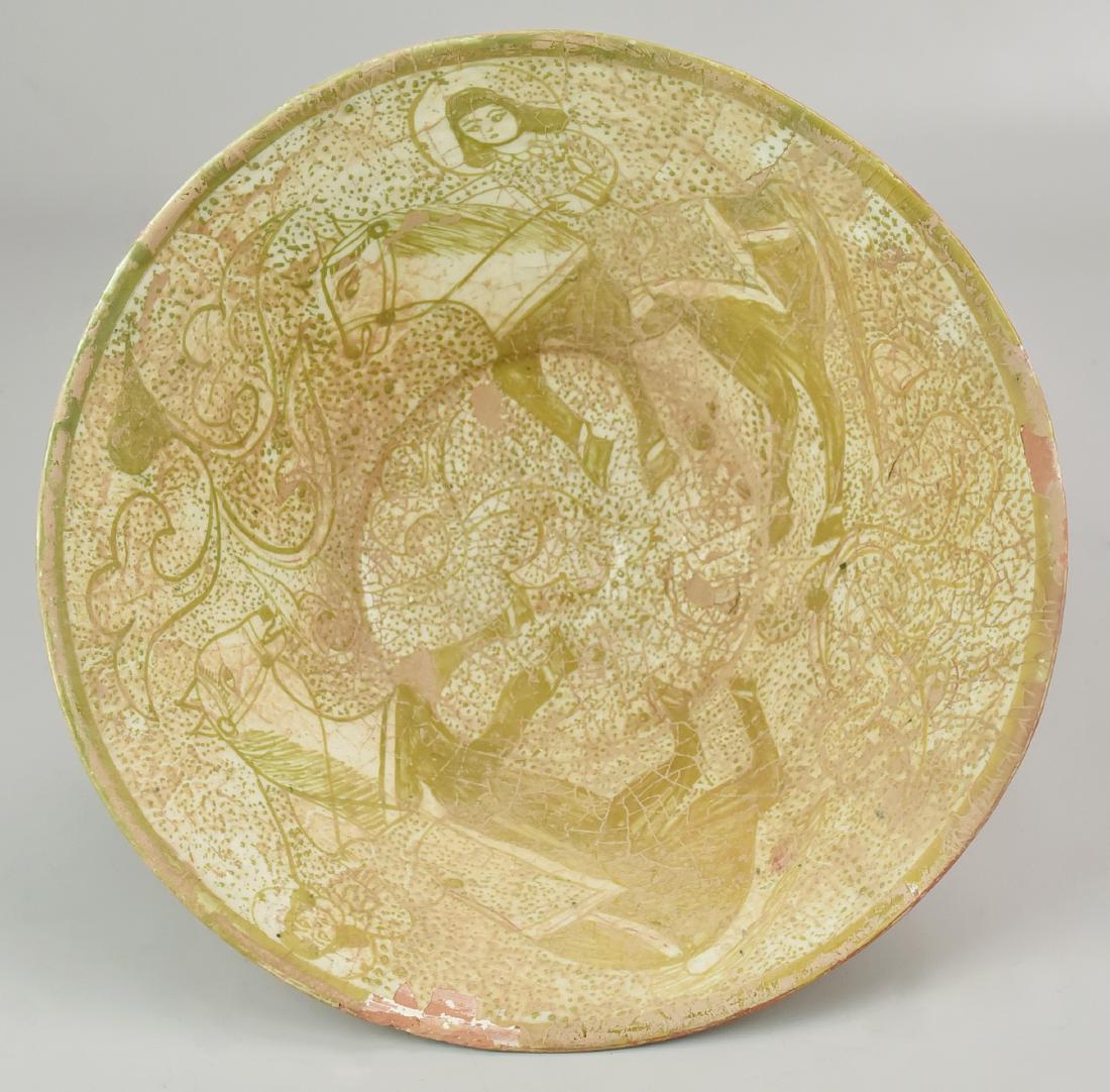 Stoneware Afghan Serving Bowl: A brown and white under-glazed stoneware serving bowl with flared sides, decorated with horses and riders, Afghanistan. Size 9.5" Dia.