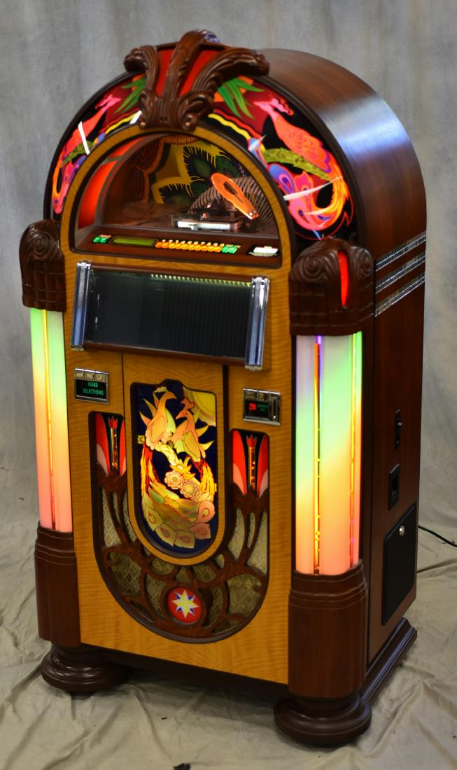 Rock-Ola Manufacturing digital jukebox: Rock-Ola Model CD8C-PB Peacock jukebox, SN127407, remote included, plays cd's, 63"h x 34"w x 24"d