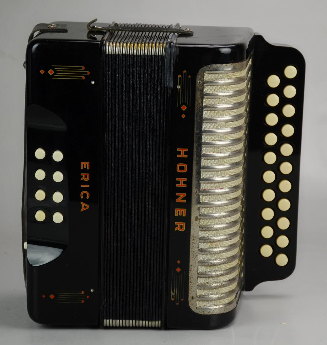 Hohner Erica Accordion Concertina: Hohner Erica accordion concertina, 21 treble buttons, 8 bass buttons, black lacquer finish, 11" x 10-1/2" x 5-3/4" closed, working condition, with several vintage music books
