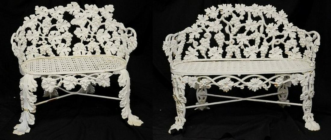 (2) Cast iron grape pattern settees: (2) Cast iron grape pattern settees, 42" w, 34" w, 509, Collection of Dorrance " dodo" H. Hamilton