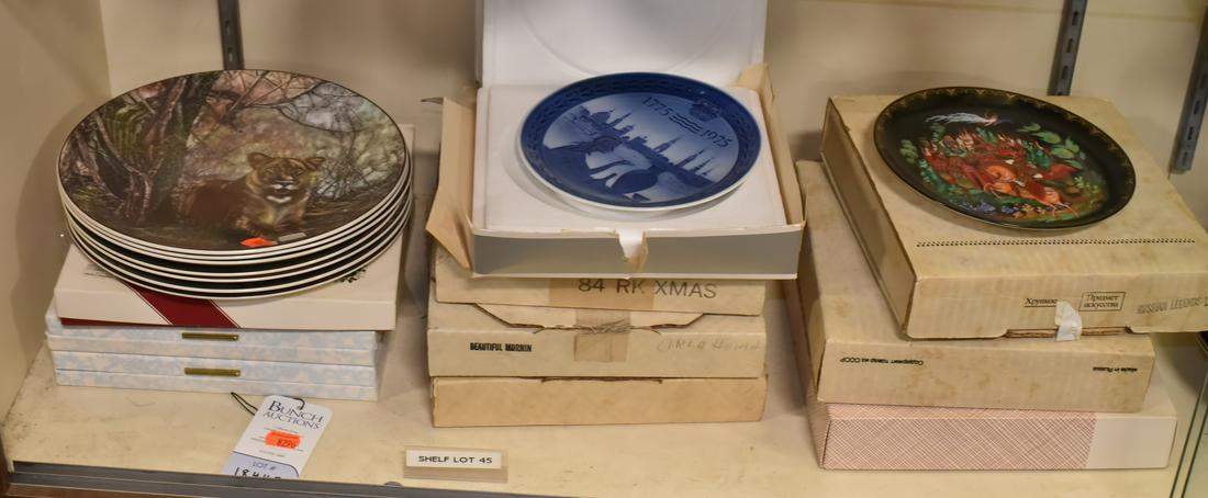 Shelf #45 - Royal Doulton Plates: Shelf #45 - (3) Knowles Plates Including Norman Rockwell, Annie and Oklahoma, Russian Decorated Plate, Calhoun's Collectors Society Picking Flowers, Royal Copenhagen, (7) Royal Doulton African Series,