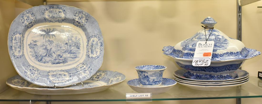 Shelf #52 - (4) Pcs Blue Transferware: Shelf #52 - (8) Pcs blue transferware, including 2 Ridgways Oriental pattern platters & 4 plates, covered vegetable (staple repair to finial), handleless cup (small chip to foot)