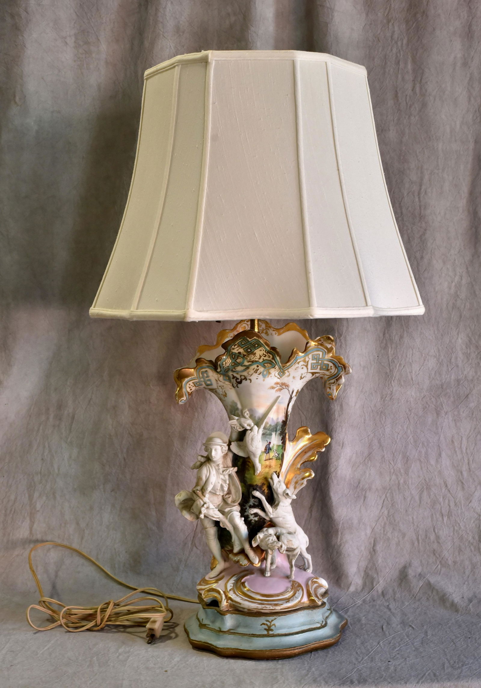 Porcelain table lamp w/ figure with dogs (1 of 2)