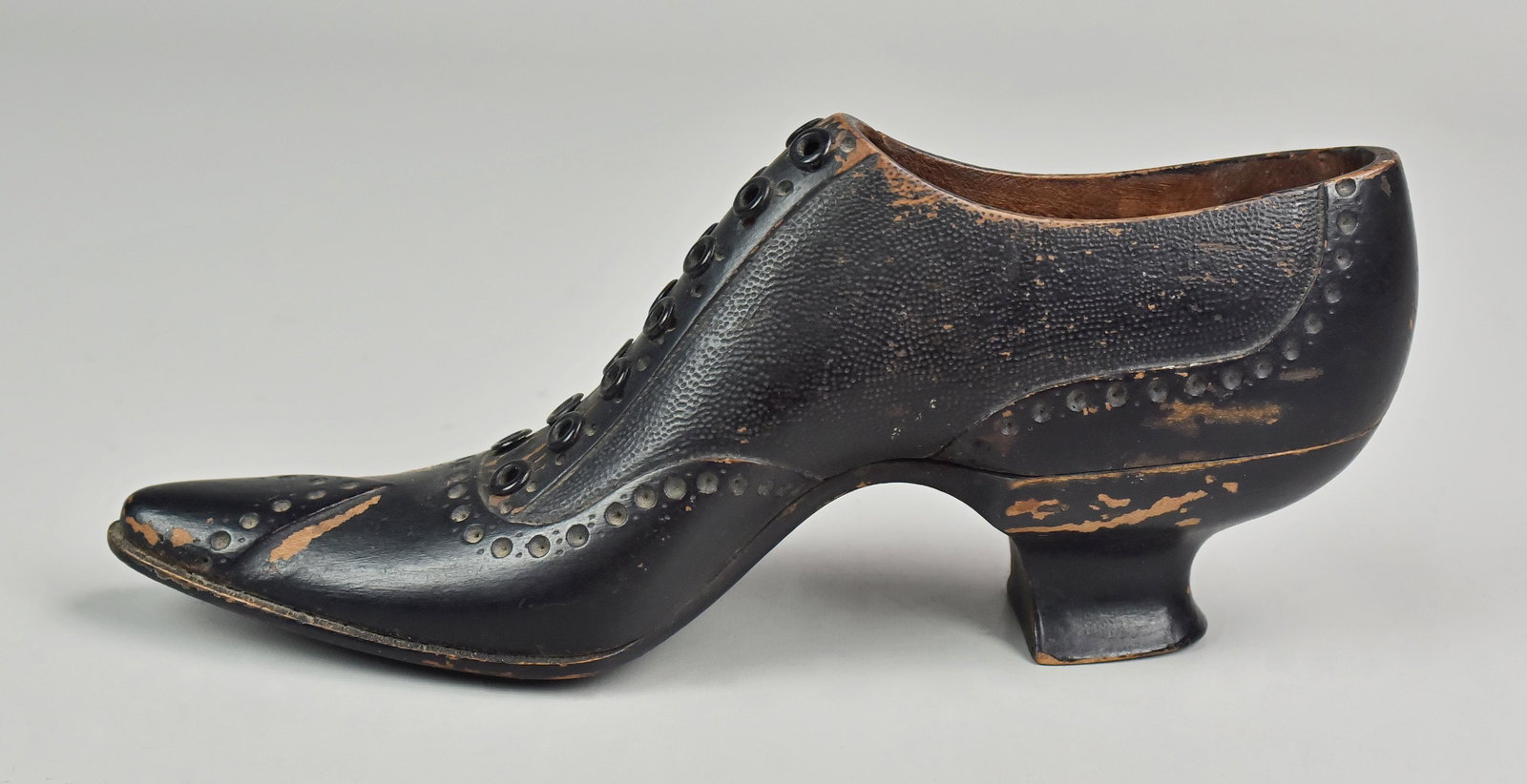 Carved wood ladies high heel shoe, 19th c style: Carved wood ladies high heel shoe, 19th c style, painted black, 9 1/2" l, 4" h
